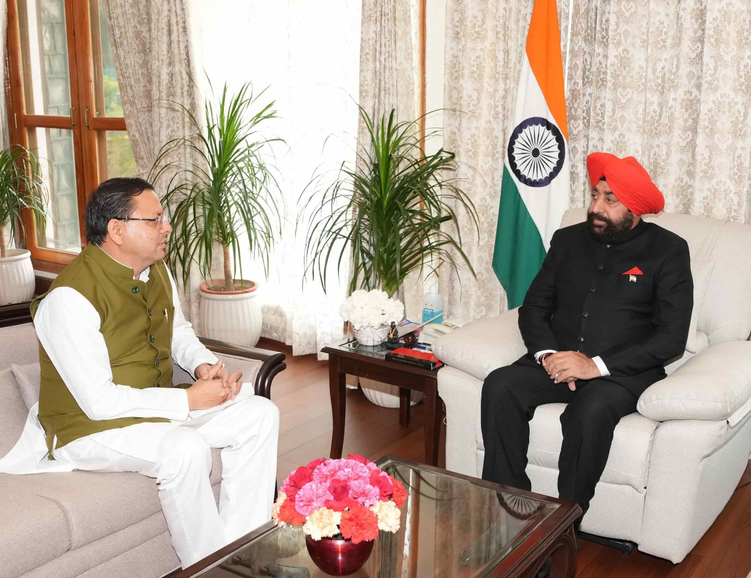 Chief Minister Shri Pushkar Singh Dhami making a courtesy call on the Governor.