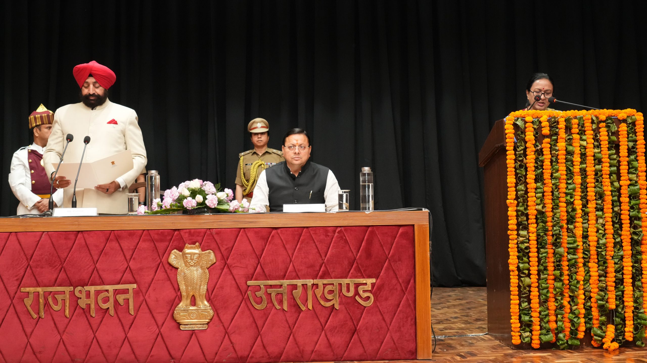 Governor administering the oath of office to Smt. Radha Raturi as State Chief Information Commissioner at Raj Bhawan.
