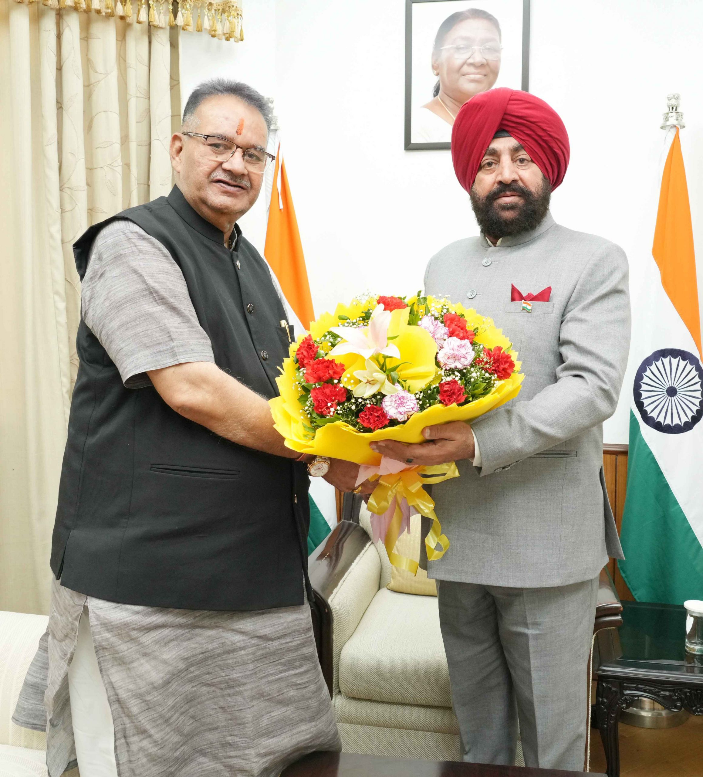 Cabinet Minister Shri Ganesh Joshi paying a courtesy call on the Governor.