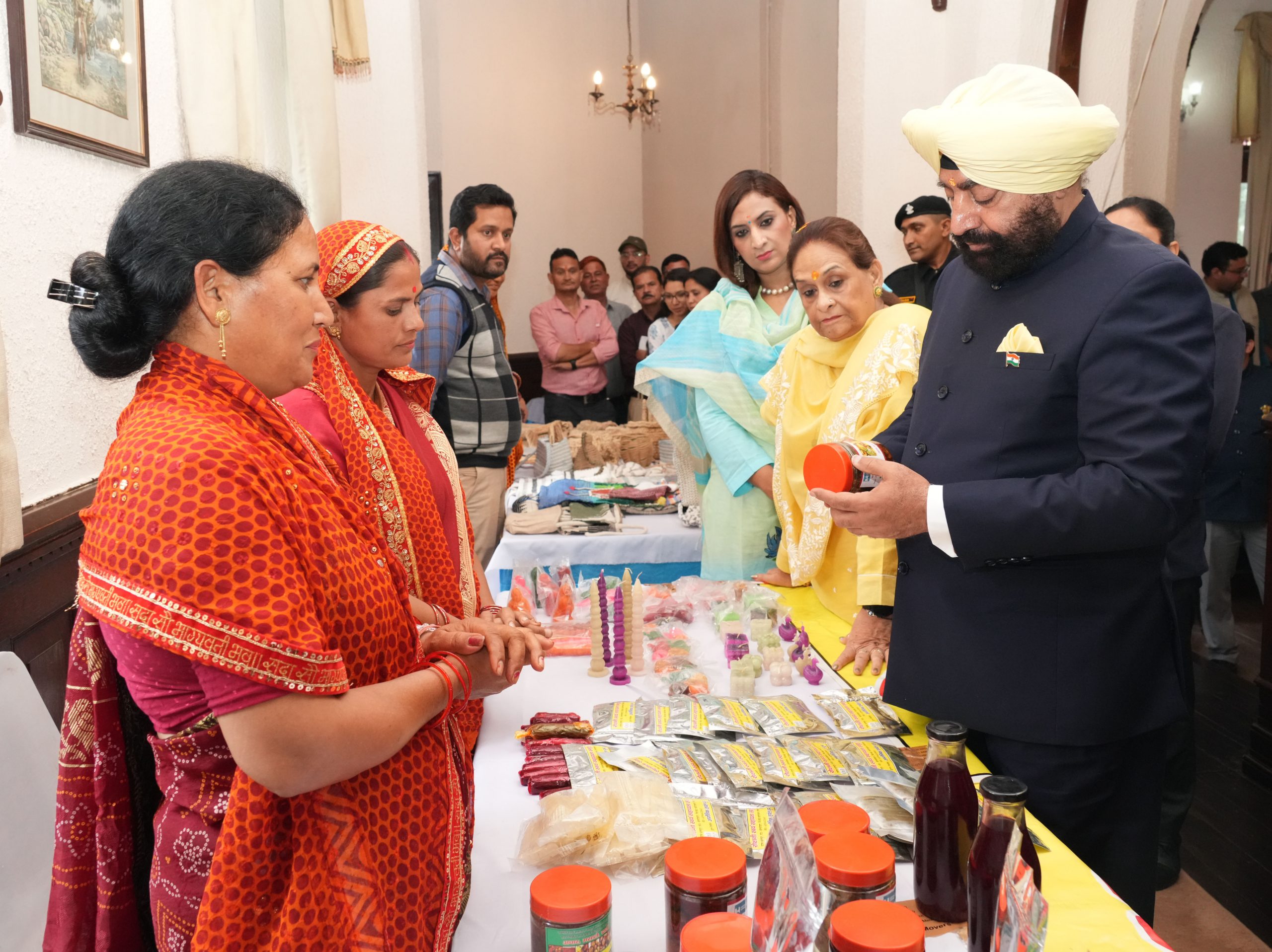 Governor observing the product exhibition organized by women self-help groups at Raj Bhawan Nainital.