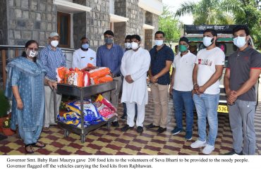Governor flagged off the vehicles filled with food items for the needy people from the Raj Bhawan.