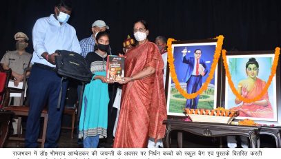 Governor congratulating the children on the birth anniversary of Dr. Ambedkar