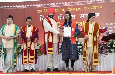 Governor presenting degrees and medals to meritorious students on the occasion of the second convocation of Doon University.