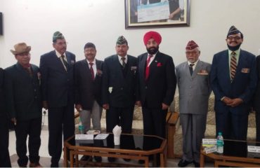 Governor with ex-servicemen in Champawat district.
