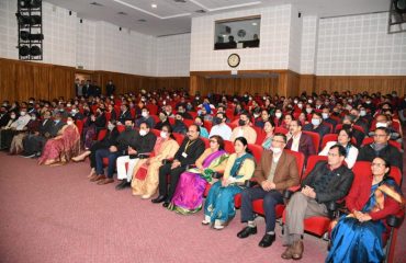 All the personnel and their families during the program at Raj Bhavan Auditorium.