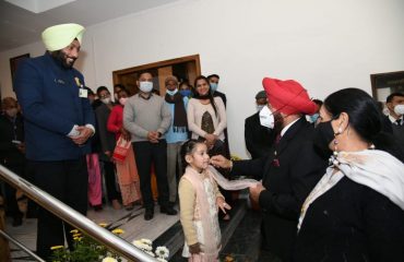 Governor interacting with the personnel and their families working in Raj Bhavan.
