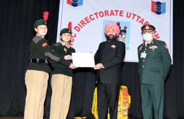 Governor felicitating NCC cadets who participated in RDC Delhi on Republic Day.