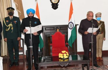 Governor Lt Gen Gurmeet Singh (R) administering the oath of office to the newly elected Senior Member of Legislative Assembly, Mr. Banshidhar Bhagat, at the Raj Bhavan.