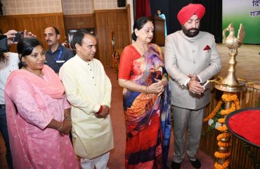 Governor Lt. Gen. Gurmeet Singh (Secretary) while inaugurating the “Path Pradhakar” program organized at the Raj Bhavan auditorium by lighting the lamp.