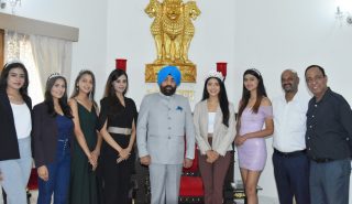 Miss Uttarakhand-2022 Aishwarya Bisht meeting the Governor and the winners of the contest.