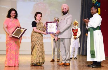 Governor Lt Gen Gurmit Singh (Retd) felicitating the teachers on the occasion of the Investiture ceremony of St. Joseph's Academy.
