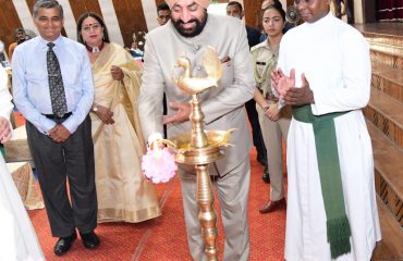 Governor Lt. Gen. Gurmit Singh (Retd) inaugurating the Investiture ceremony of St. Joseph's Academy by lighting the lamp.