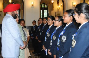 Governor Lt Gen Gurmeet Singh (R) interacting with the students of St. Mary's Convent College, Ramani, Nainital at Raj Bhavan, Nainital.