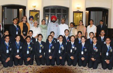 Governor Lt Gen Gurmeet Singh (S) with girl students of St. Mary's Convent College, Ramani, Nainital at Raj Bhavan Nainital.