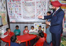 Governor Lt Gen Gurmit Singh (Retd) meeting with children at Anganwadi Centre.;?>