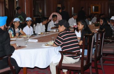 Governor Lt Gen Gurmit Singh (Retd)having lunch with the children of SOS Children's Village, Bhimtal.