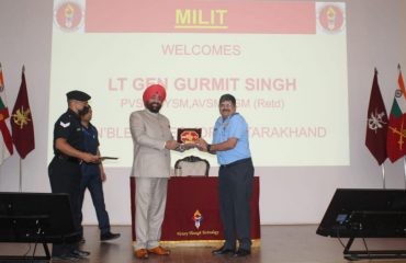 Governor Lt Gen Gurmit Singh (Retd) presenting a memento on the occasion of the event organized at Military Technology Institute.