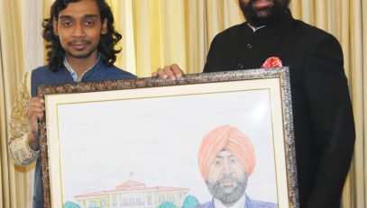 Apoorva Om, a young artist with hearing impairment, presenting his painting to Governor Lt Gen Gurmit Singh (Retd).