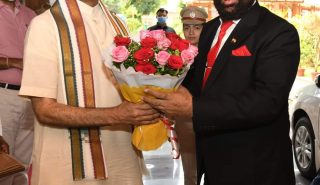 Governor Acharya Devvrat welcoming the Governor on his arrival in Gujarat.