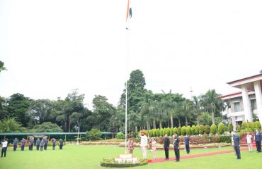 Governor hoisted the flag at the Raj Bhawan on the occasion .
