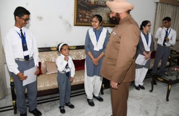Governor Lt Gen Gurmit Singh (Retd) meeting the children of Bajaj Institute of Learning Institute at Raj Bhawan.
