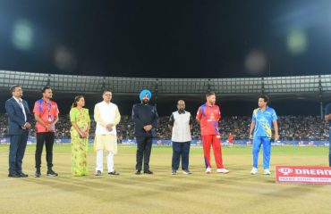 Governorand Chief Minister Pushkar Singh Dhami with the players of the Legends of Road Safety World Series at the Rajiv Gandhi International Cricket Stadium.