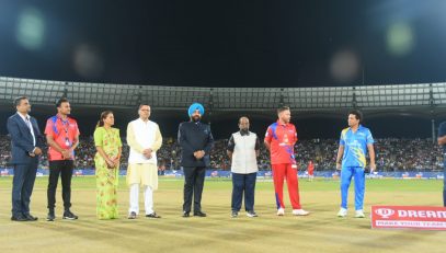 Governorand Chief Minister Pushkar Singh Dhami with the players of the Legends of Road Safety World Series at the Rajiv Gandhi International Cricket Stadium.