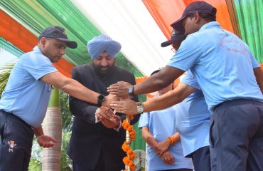 Governor inaugurating the Khel Mahakumbh-2022 by lighting the lamp.