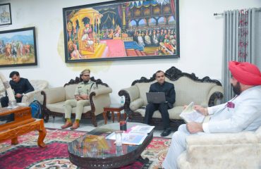 Governor chairing a meeting with administrative officials, at Rudraprayag.