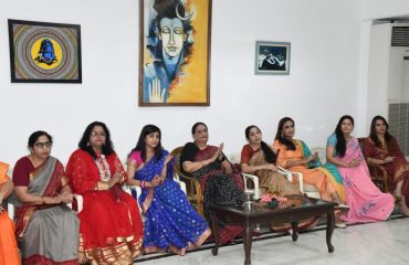 First lady Mrs. Gurmit Kaur with the women of Raj Bhawan family present in the cultural program on the occasion of Karva Chauth festival.