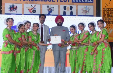 Governor Lt Gen Gurmit Singh (Retd) presenting the citation to the girl students at the first 