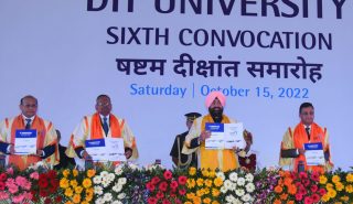 Governor Lt Gen Gurmit Singh (Retd) unveiling the Annual Report Souvenir at the 6th Convocation at DIT University.