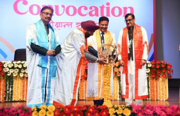Governor inaugurating the second convocation ceremony of Uttaranchal University by lighting the lamp.