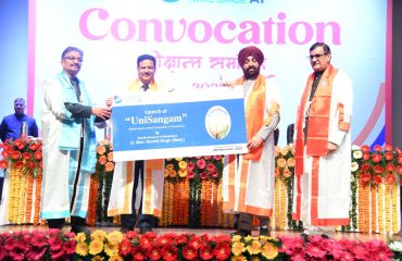Governor launching the mobile app 'Online Course Program' on the occasion of second convocation program of Uttaranchal University.
