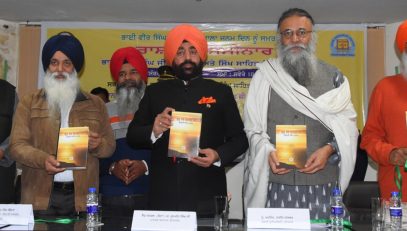 Governor releasing the book on the occasion of 150th birth anniversary of 'Bhai Veer Singh Ji'.