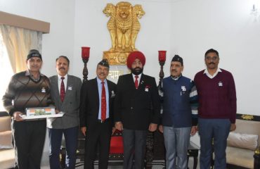 Director, Sainik Welfare and Rehabilitation Brigadier Amrit Lal (Retd) and other officers along with the Governor.