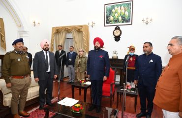 HE Lt. Gen. Gurmit Singh (Retd) administers the oath of office and secrecy to the newly appointed State Information Commissioner, Mr. Yogesh Bhatt.