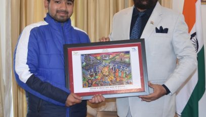 Child artist Anurag Ramola presenting a painting based on Lokparv Egas-Bagwal of Devbhoomi Uttarakhand, to Governor.