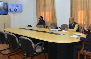 Governor receiving information from officials through VC regarding landslide situation