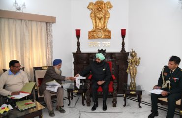 Governor listening to the problems of ex-servicemen and their dependents at Raj Bhavan.