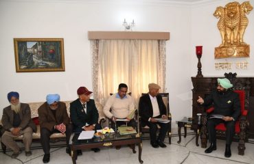Governor listening to the problems of ex-servicemen and their dependents at Raj Bhavan.