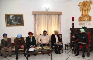 Governor listening to the problems of ex-servicemen and their dependents at Raj Bhavan.