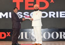 Governor felicitating the speakers at the TEDx Mussoorie event organized at Raj Bhavan.;?>