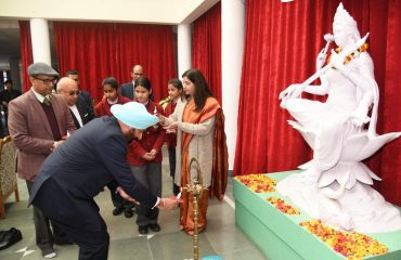 Governor lights the lamp for the inauguration of the painting competition at Him Jyoti School, Dehradun, Sahastradhara Road.