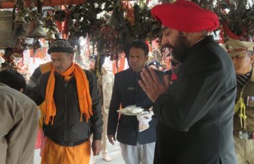 Governor offering prayers at Golu Devta Ghorakhal temple.