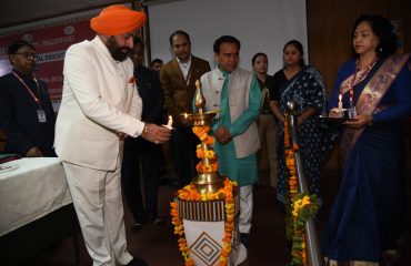 Governor lights the lamp to inaugurating the five-day workshop organized by Uttarakhand Open University