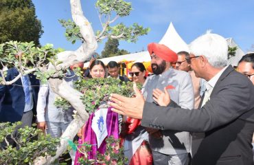 Governor and Chief Minister Pushkar Singh Dhami observing the flower exhibition on the occasion of Vasantotsav-2023 at Raj Bhawan.