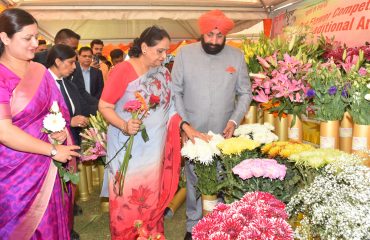 Governor and Chief Minister Pushkar Singh Dhami observing the flower exhibition on the occasion of Vasantotsav-2023 at Raj Bhawan.