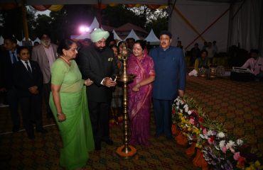 Inaugurating the cultural evening organized on the second day of Vasantotsav-2023 by lighting the lamp, Governor, First Lady Mrs. Gurmeet Kaur, Chief of Hans Foundation Mata Mangla and Bhole Ji Maharaj.