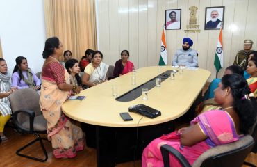 Self-help group women share their experiences and presentation with Governor at LBSNAA.